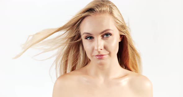 Blonde Woman Smiling Windy Hair