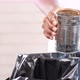 Throwing Tin Container in a Garbage Bin - VideoHive Item for Sale