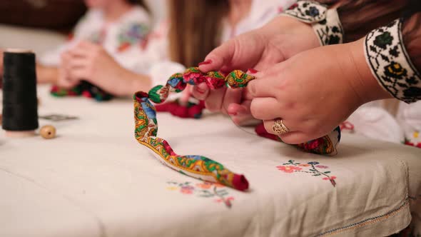 A Group of Girls Make Jewelry From Shawls Handmade Needlework Circle alt