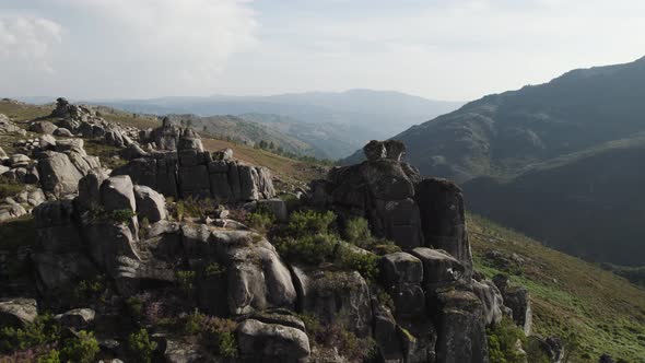 Granitic rocks on the top of a hill at Geres national park in Portugal dolly out