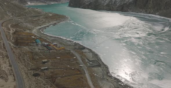 Tranquil Lake Surrounded By Rocky Slopes Mountains At Attabad Lake, Gojal Valley, Hunza, Gilgit-Balt alt