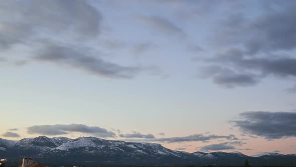 Time-lapse of Parnitha mountain, Greece during golden hour with snow on top of the mountain alt