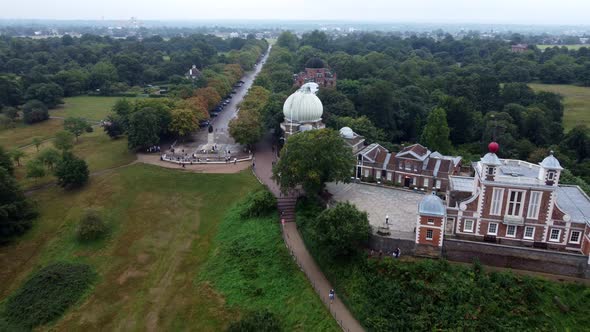 Drone View of a Green Park with an Observatory in Cloudy Weather