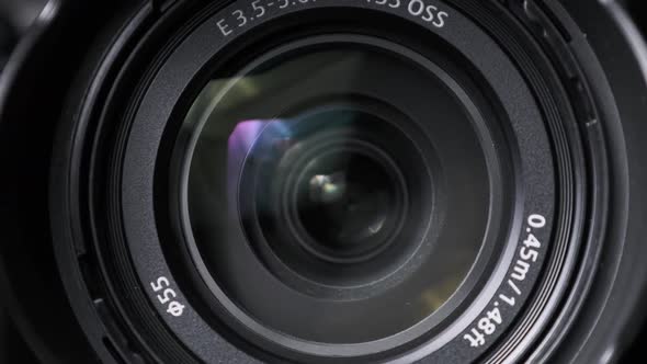 The Camera Lens Rotates Lights Reflecting Off Glass Robotic Camera Movement alt