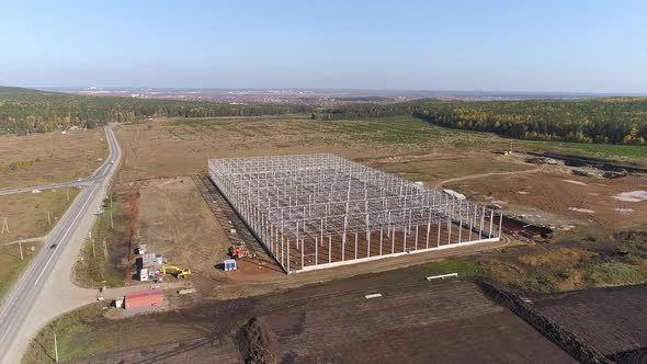 Construction Of Industrial Buildings From Metal and concrete Constructions, Aerial Shot 02 alt