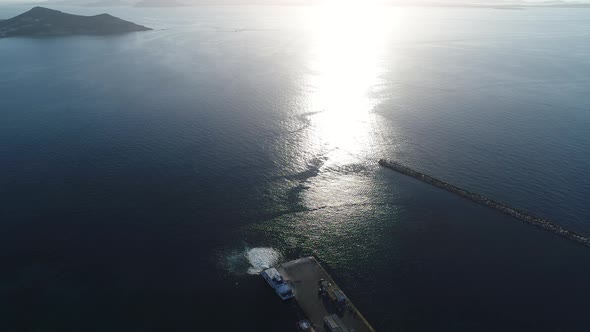Port of Chora on the island of Naxos in the Cyclades in Greece aerial view alt