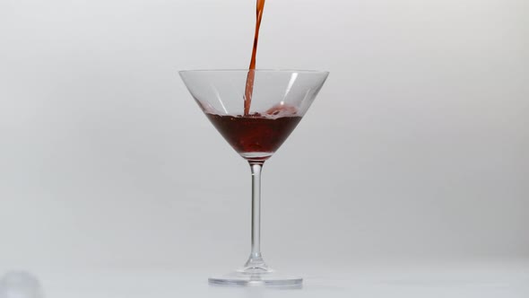 Red wine being poured into glass, Ultra Slow Motion alt