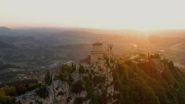 Flying over the amazing hilltop fortresses on Monte Titano in San Marino. alt