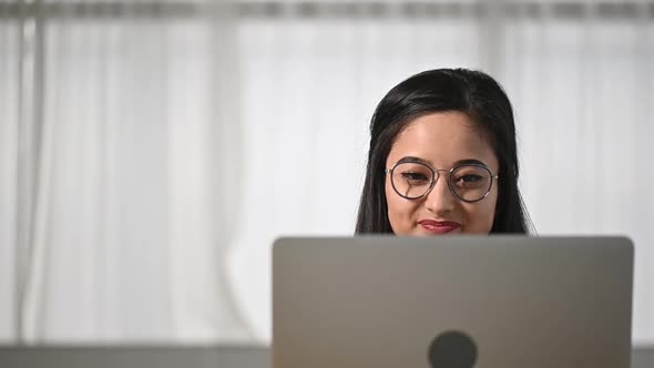 Asian businesswoman freelancer presents project with gestures to boss. alt