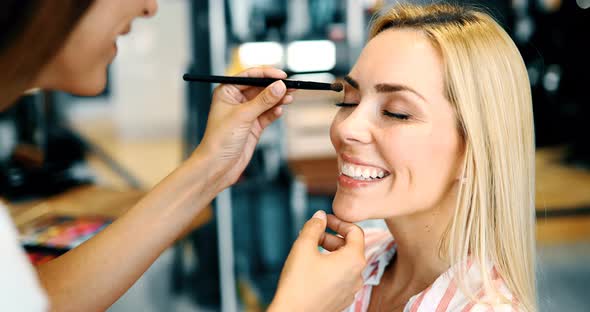 Portrait of Beautiful Woman Getting Cosmetic Care at Beauty Salon