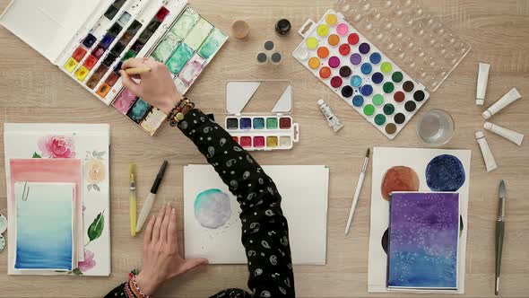 Watercolor painting timelapse, Creative background. Artistic scene: brush, paints, paper, ink