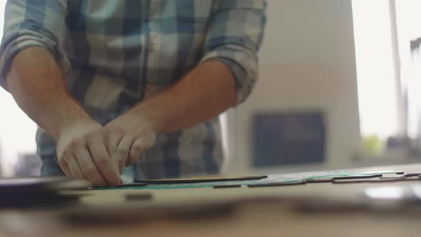 Carpenter Paints Products with Protective Paint