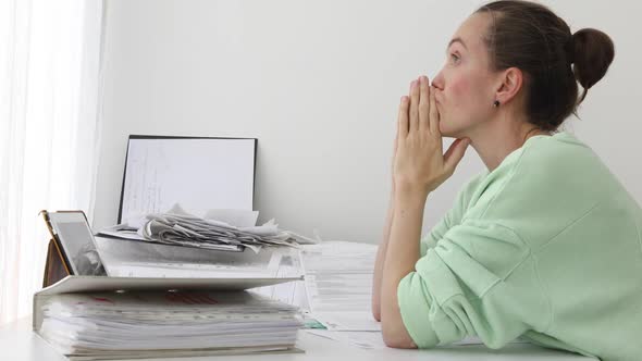 Woman Bored Doing Paper Working alt