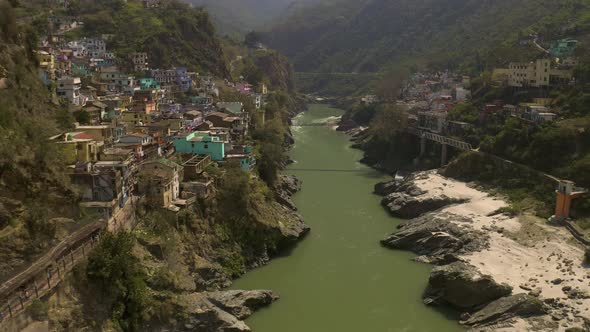 Devprayag, India, alakananda and bhagirathi holy rivers mix to become ganges, 4k aerial drone view alt