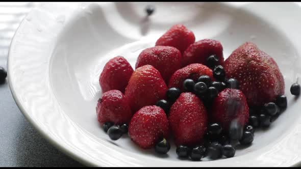 Fresh Strawberries in a Plate on the Table