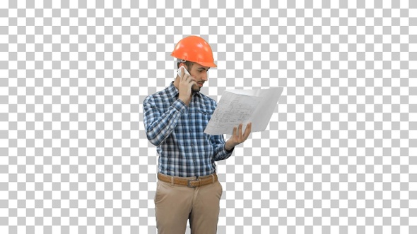 Site manager talking on the phone holding blueprints, Alpha Channel