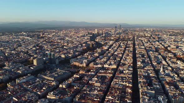 Cityscapes of Madrid From a Drone Under the Soft Lighting of a Sunset