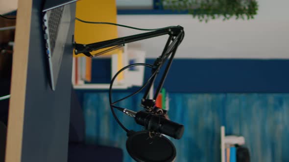 Vertical Video Professional Podcast Microphone of Influencer in Empty Living Room alt