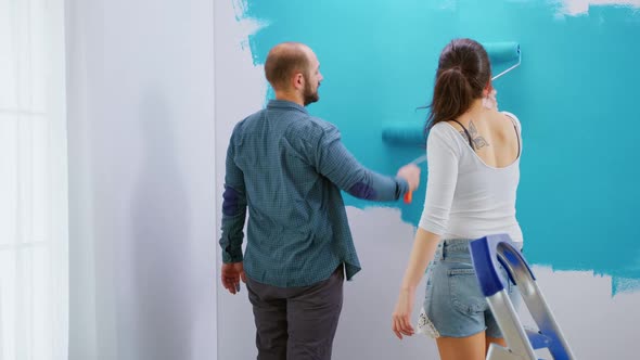 Husband Redecorating Apartment alt