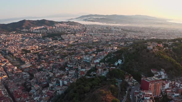 Drone shot of beautiful sunrise over North East Barcelona alt