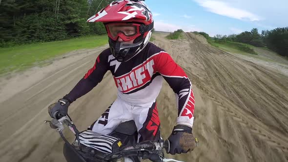 motocross rider no hands trick jump gopro pole cam front angle alt