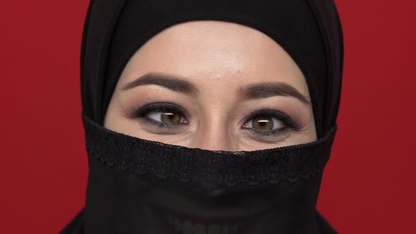 Macro Portrait of Middle Eastern Woman with Smoky Eyes Visage in Black Niqab Fooling Around and alt