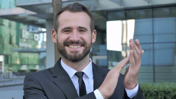 Applauding Successful Businessman Clapping alt