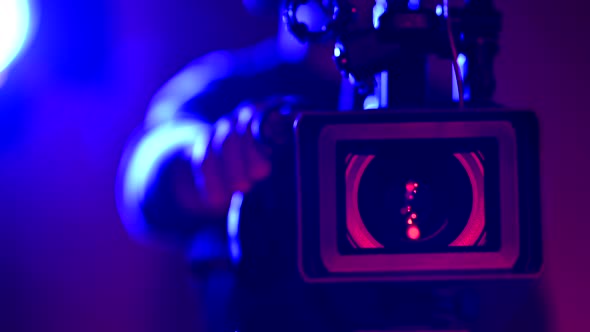 Telephoto Digital Film Camera Lens and Operator alt