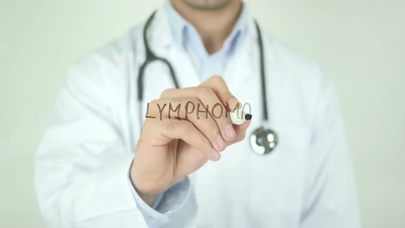 Lymphoma, Doctor Writing on Transparent Screen alt