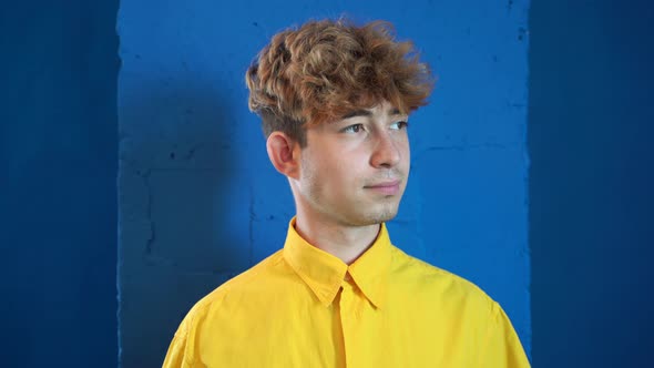 Fashionable Boy Smiles in Yellow Shirt Young Guy alt