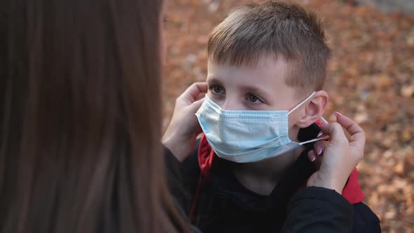 Mom Takes Off the Medical Mask From Her Son's Face