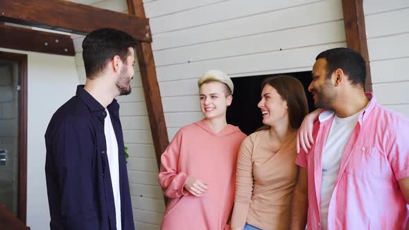 Multiracial Group of Happy Young People Smiling and Laughing Together alt