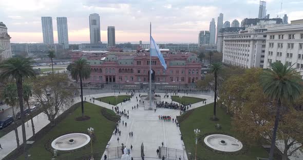 Aerial Drone Scene of May Square and Casa Rosada. The camera travels forward with the sunset. Landsc alt