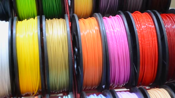 Multicolored Filaments of Plastic for Printing on a 3D Printer Closeup alt