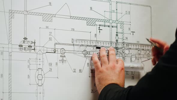 Architect Designer Working with Plan Blueprint Closeup alt