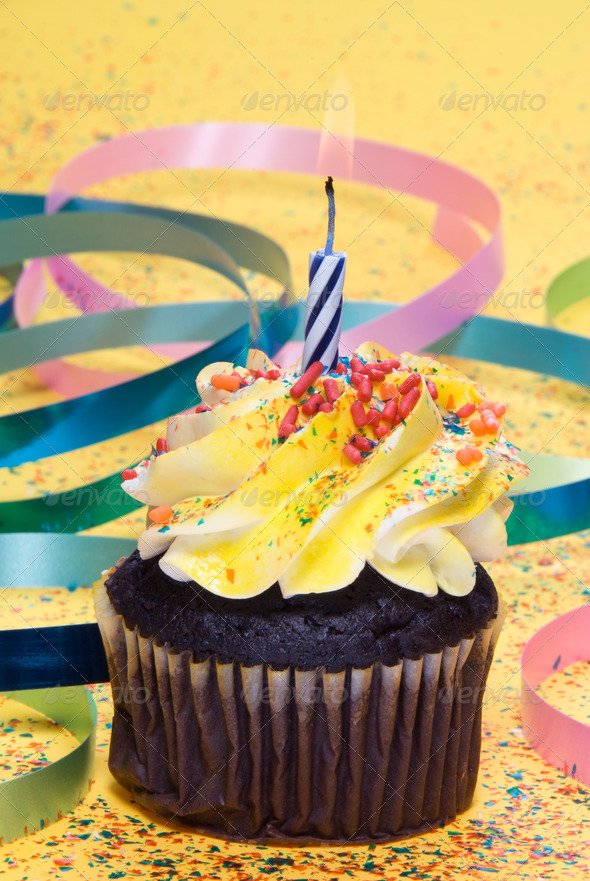 Cupcake with candle - Stock Photo - Images