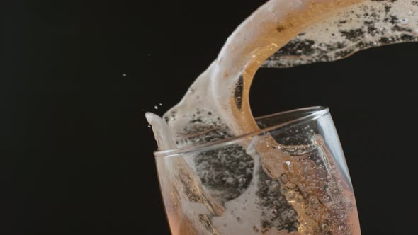 Beer pouring and splashing in super slow motion.  Shot on Phantom Flex 4K high speed camera.