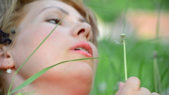 Young Lady Playing With a Dandelion 01