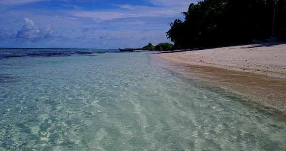 Beautiful above island view of a white sandy paradise beach and turquoise sea background in vibrant  alt