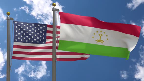 Usa Flag Vs Tajikistan Flag On Flagpole alt