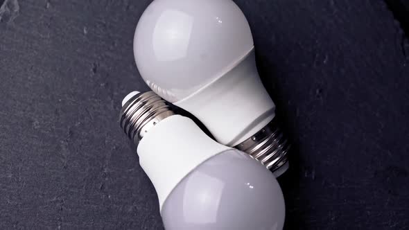 led light bulbs on black background alt