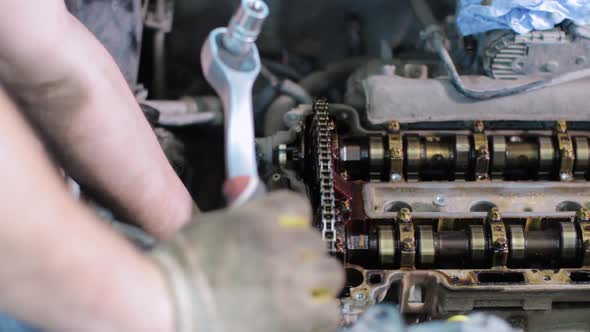 Car mechanic working in service center