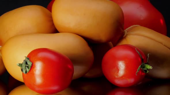 Different Tomatoes Lie Among Sausages Before Preparation alt