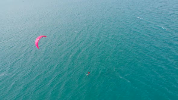 Aerial View of the City Beach and Active People Practicing Kite Surfing and Windsurfing. Kitesurfing alt