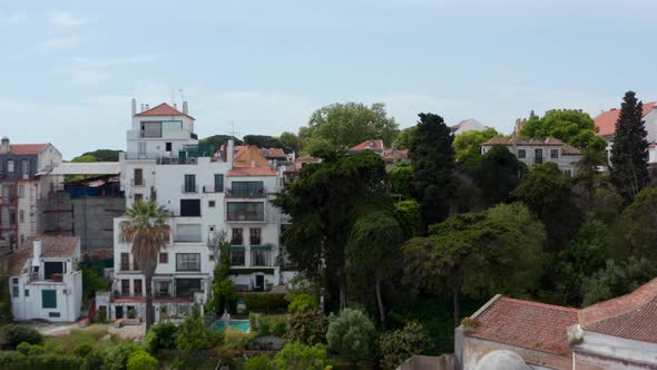 Drone Camera Following Terrain Profile and Rising Over Hill alt