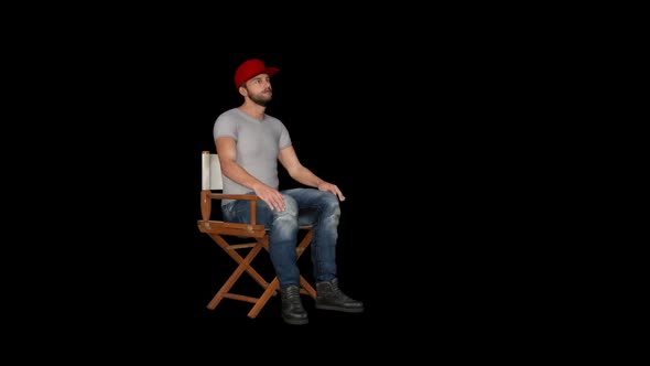 The Man is Sitting in a Chair 