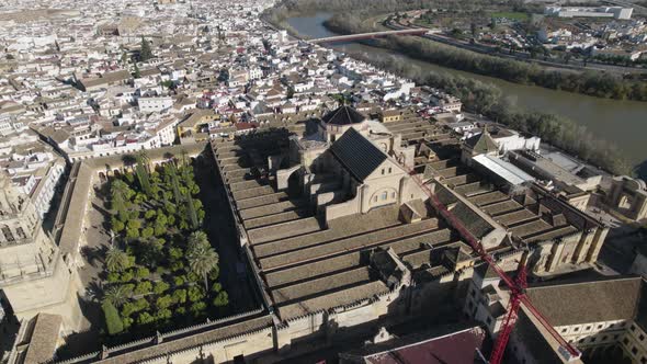 Mosque or Cathedral of Our Lady of Assumption close to Guadalquivir river, Cordoba in Spain. Aerial