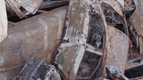 Vertical Video of Burned and Shot Cars During the War in Ukraine alt