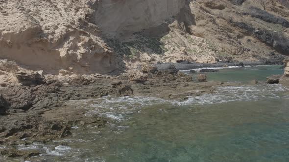 Rocky cliff at Porto dos Frades, Madeira in Portugal. Panning alt
