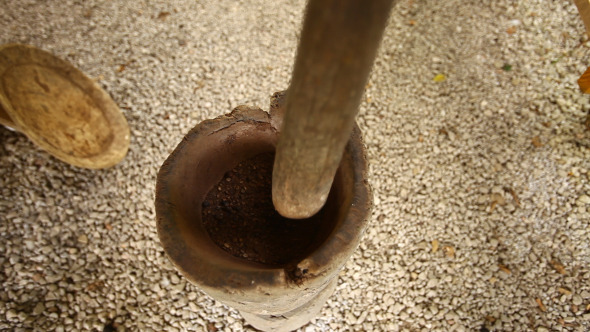 Traditional Process Of Grinding Coffee Beans